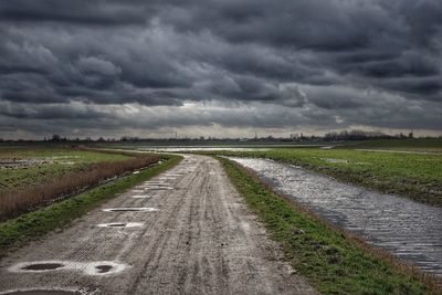 Storm clouds over agricultural field