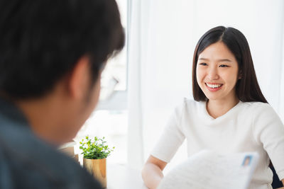 Portrait of a smiling young woman