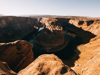 Aerial view of rock formations against sky