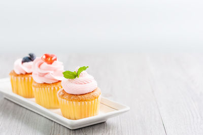 Close-up of cupcakes on table