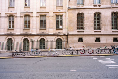 Road by building in city