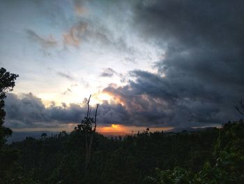 Scenic view of dramatic sky during sunset