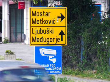 Close-up of warning sign on road