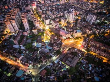 High angle view of illuminated cityscape at night