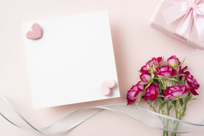 High angle view of rose bouquet on white table