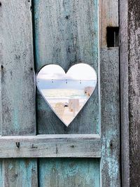 Close-up of heart shape on door