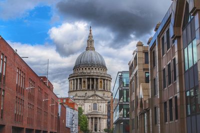 View of buildings in city against sky