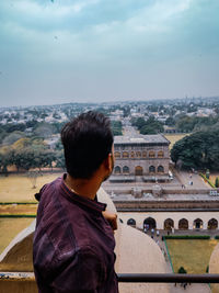 Rear view of man looking at view