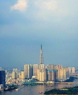 Modern buildings in city against sky