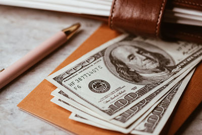 Close-up of banknotes on table