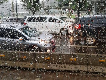 Full frame shot of wet window in rainy season