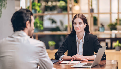 Lawyer women looking clint during advise at desk