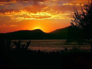 Scenic view of dramatic sky during sunset
