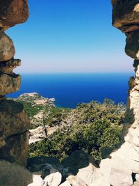 Scenic view of sea against blue sky