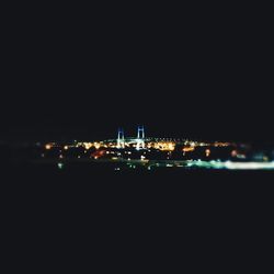 Illuminated cityscape at night