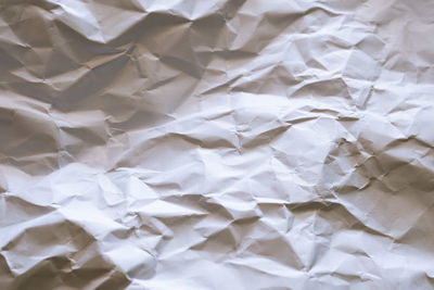 High angle view of garbage on paper