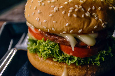 Close-up of burger in plate on table