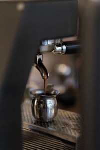 Close-up of coffee cup on table