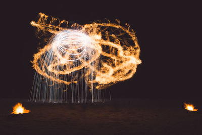 Bonefire display at night on a beach