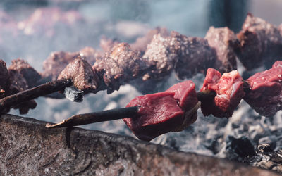 Close-up of meat on grill