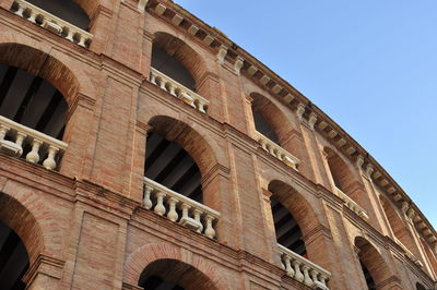 Low angle view of historical building against clear sky