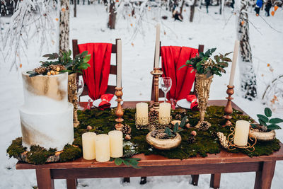 High angle view of place setting on table at snow during wedding