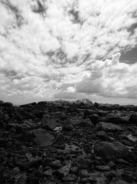 Rock formations on landscape against sky