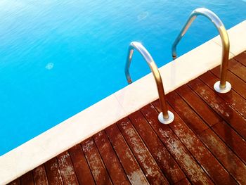 High angle view of swimming pool ladder