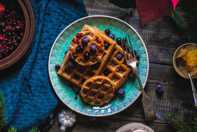 Directly above shot of cookies in plate on table