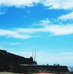 Low angle view of built structure against blue sky