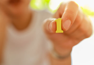 Close-up of woman holding hands