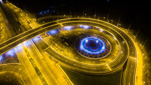 High angle view of light trails on road