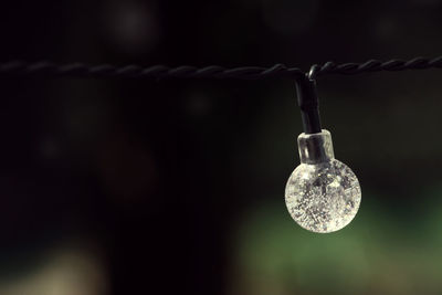 Close-up of chain hanging on metal