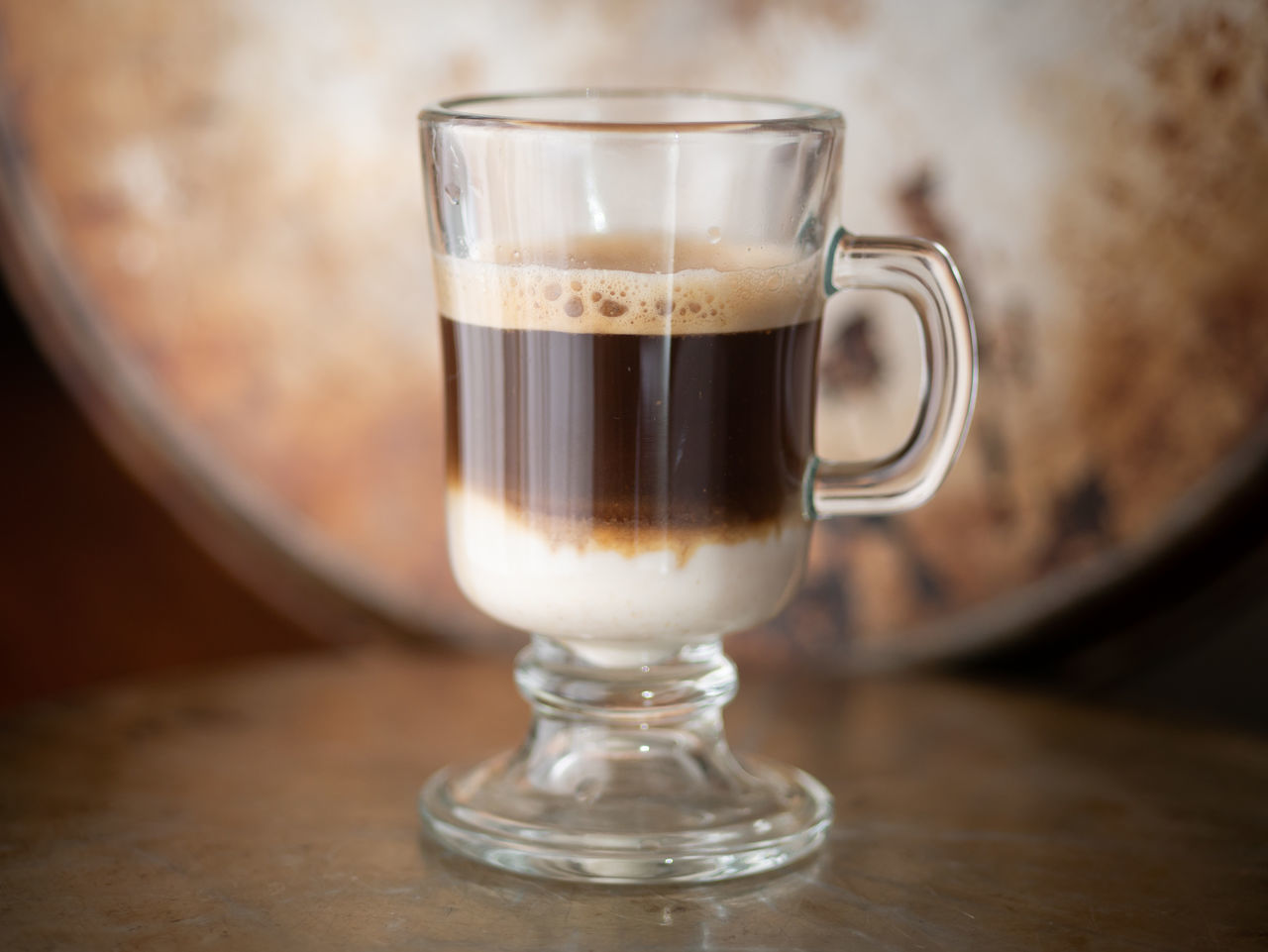 CLOSE-UP OF COFFEE SERVED ON TABLE