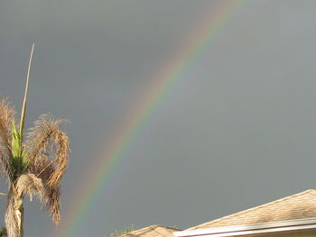 Low angle view of rainbow against sky