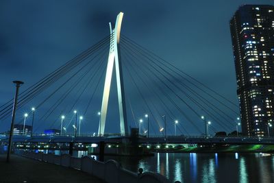 View of suspension bridge at night