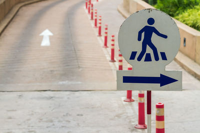 Arrow sign on road