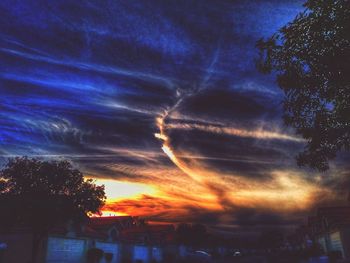 Scenic view of cloudy sky at sunset