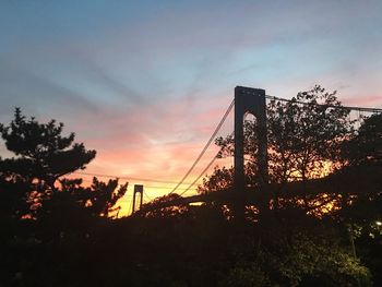 Silhouette of bridge at sunset