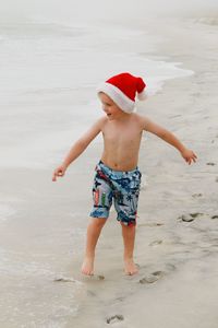 Full length of woman on beach