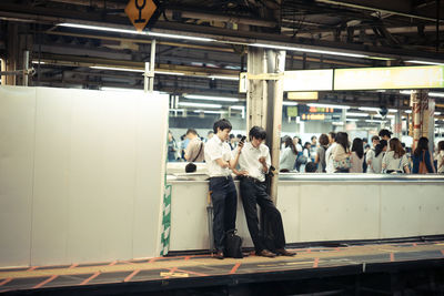 People sitting on bench
