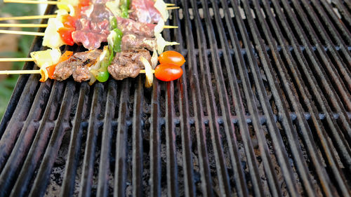 Close-up of meat on barbecue grill