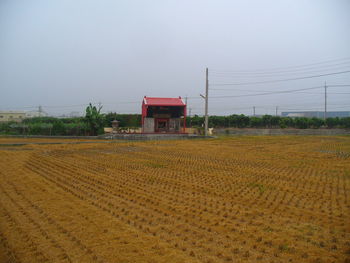 Agricultural field against clear sky
