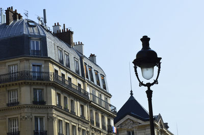 Low angle view of street light against clear sky