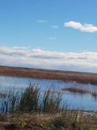 Scenic view of lake against sky