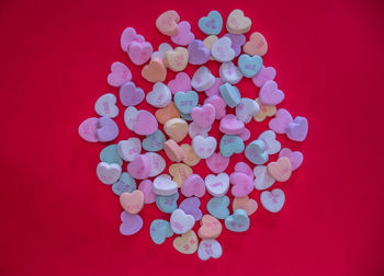 Directly above shot of pills on yellow background