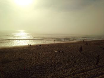 View of beach against sky during sunset