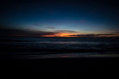 Scenic view of sea at sunset