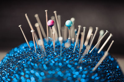 Close-up of sewing needles and pins