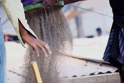 Close-up of people working